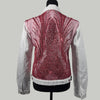 back view of white embellished denim jacket with red sequins