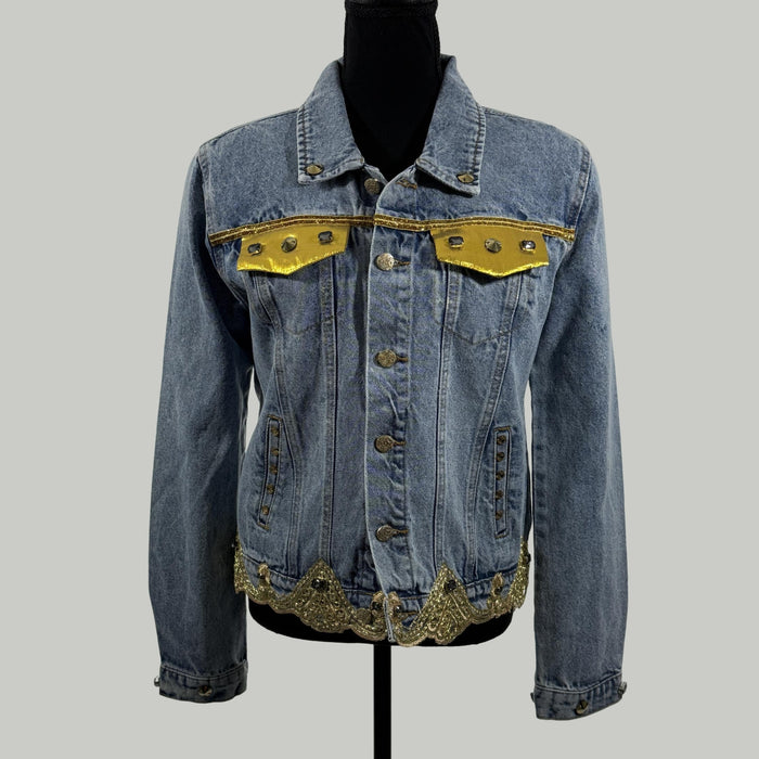 front view of blue denim jacket with gold appliqué embellishments