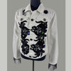 front view of crystal embellished denim jacket with appliqué and fringe