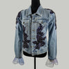 front view of purple embellished denim jacket with floral beadwork