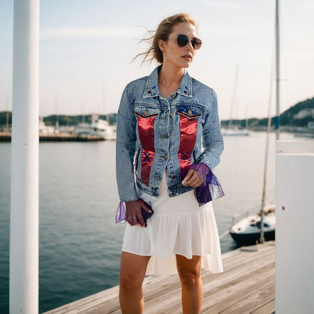 front view of red and blue satin panel embellished denim jacket with ruffle sleeves